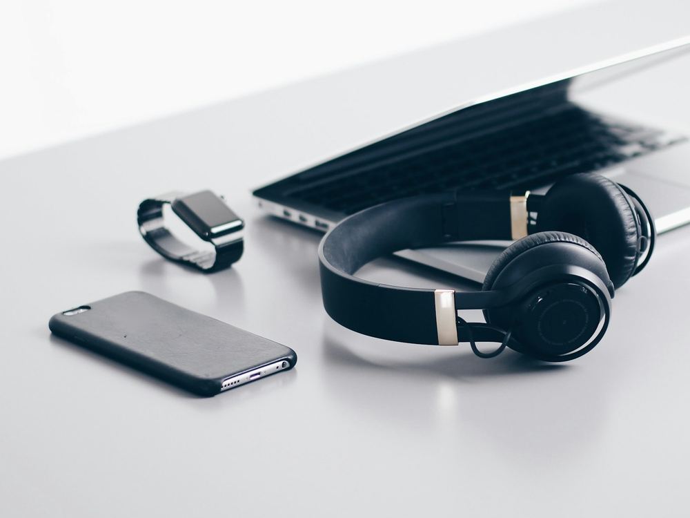 Laptop, smartphone, smartwatch and wireless headphones